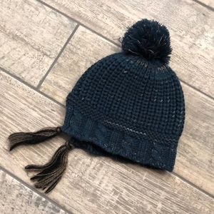 Blue beanie with pom pom